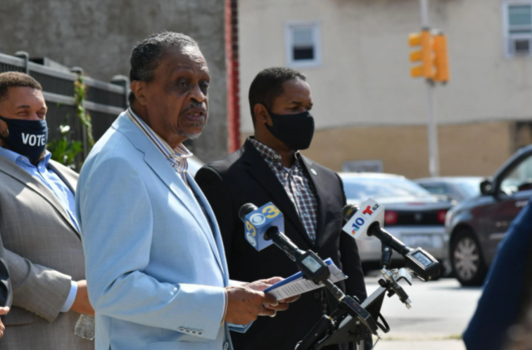 Rev. Robert Collier Sr. speaks at a press conference