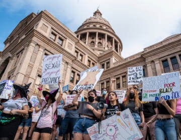 Protesters take part in the Women's March and Rally for Abortion Justice at the State Capitol in Austin, Texas, on October 2, 2021. - The abortion rights battle took to the streets across the US, with hundreds of demonstrations planned as part of a new 