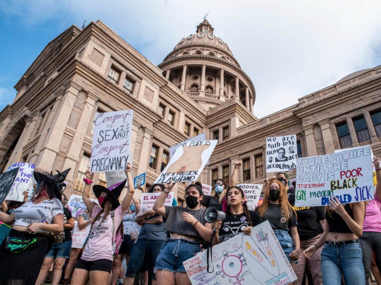 Protesters take part in the Women's March and Rally for Abortion Justice at the State Capitol in Austin, Texas, on October 2, 2021. - The abortion rights battle took to the streets across the US, with hundreds of demonstrations planned as part of a new 