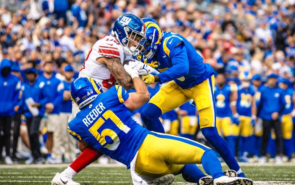 Delaware native Troy Reeder, who uses the exercises, makes a tackle for the Rams against the New York Giants this year