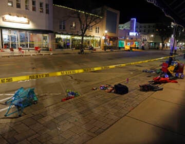 Police tape cordons off a street