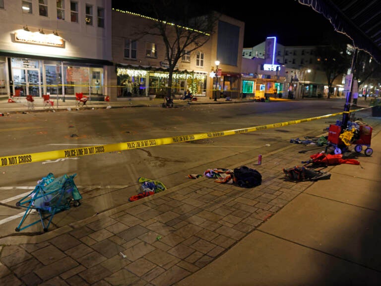 Police tape cordons off a street