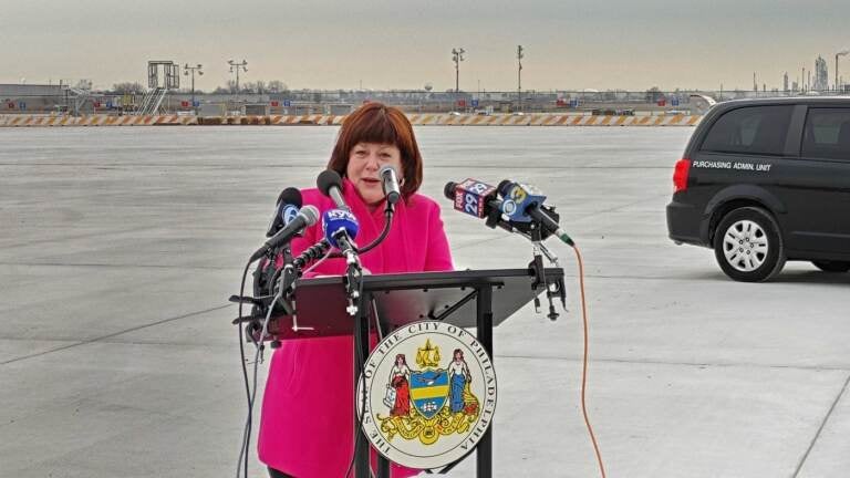 Chellie Cameron speaks at the Philadelphia International Airport