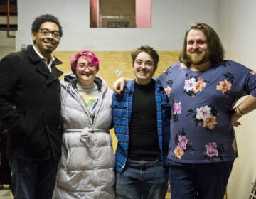 (From left) Writer Quinton Alexander, Painted Mug board member Taylor Plunckett-Clements, writer/director CJ Higgins and Painted Mug board member and building owner, Vinni, “Beary Tyler Moore” at the Painted Mug, a queer cafe in progress, on the 1500 of Jackson Street in South Philadelphia. (Kimberly Paynter/WHYY)