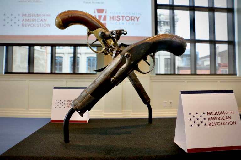 A stolen pair of Revolutionary War era French military pistols are returned to the Museum of the American Revolution in Philadelphia. (Emma Lee/WHYY)