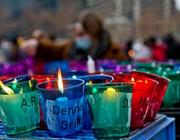 Over 300 votives bore the names of people who experienced homelessness, lost in 2021 at Homeless Memorial Day at Thomas Paine Plaza in Philadelphia on Dec. 21, 2021