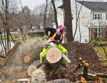 Elementary school teacher Nicki Besada, aka “Chainsaw Barbie”, is part of The Upper Darby Chainsaw Gang that’s working to clear debris since a tornado tore apart the area in September 2021