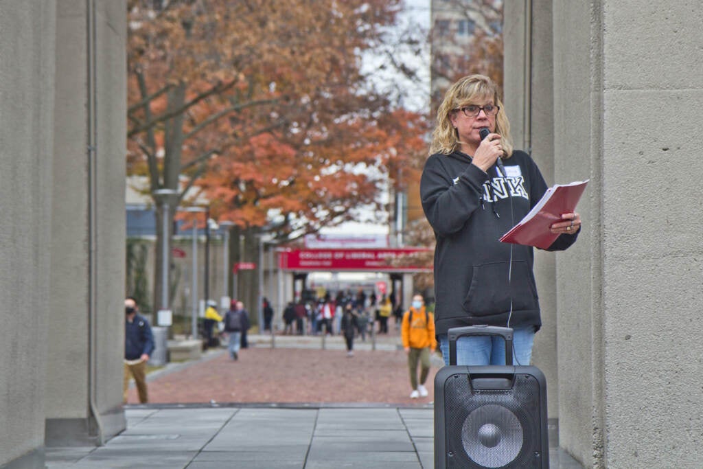 Virginia Jorgensen speaks to a crowd at an anti-violence rally