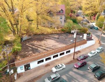 An aerial view of a low-rise grocery store