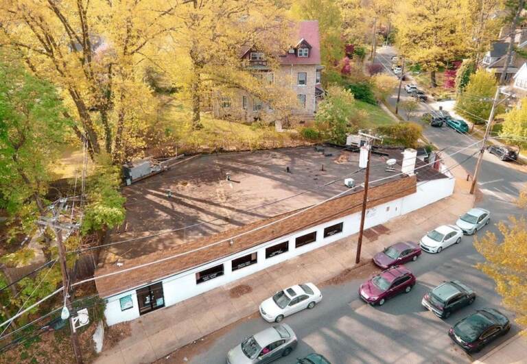 An aerial view of a low-rise grocery store