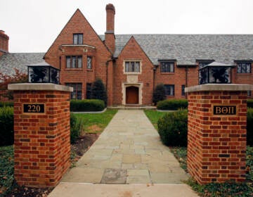 This file photo from Nov. 9, 2017 shows the Beta Theta Pi fraternity house on the Penn State University main campus in State College, Pa. The former house manager of a now-defunct Penn State fraternity where a pledge fell during a night of hazing and drinking and later died has been placed on two years' probation on a hindering apprehension conviction. Braxton Becker, 23, of Niskayuna, N.Y., was also ordered to pay a $5,000 fine and do 100 hours of community service on the conviction stemming from the Feb. 2017 death of 19-year-old Timothy Piazza of Lebanon, N.J.