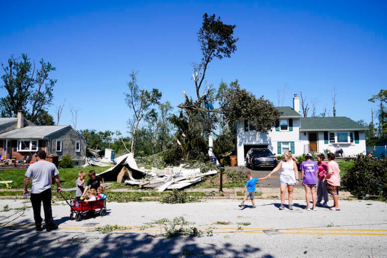 File photo: People inspect damage in Fort Washington, Pa. Thursday, Sept. 2, 2021 in the aftermath of downpours and high winds from the remnants of Hurricane Ida that hit the area.