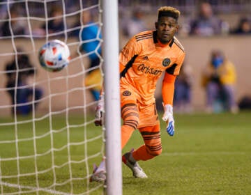 Philadelphia Union's Andre Blake watches as the show by Nashville SC's Hany Mukhtar goes in for a goal during the first half of an MLS playoff soccer match, Sunday, Nov. 28, 2021, in Chester, Pa. (AP Photo/Chris Szagola)