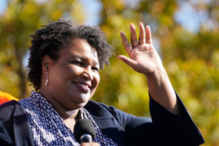 FILE - In this Monday, Nov. 2, 2020, file photo, Stacey Abrams speaks to Biden supporters as they wait for former President Barack Obama to arrive and speak at a campaign rally for Biden at Turner Field in Atlanta. (AP Photo/Brynn Anderson, File)