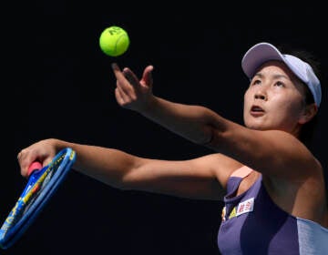 File photo: China's Peng Shuai serves to Japan's Nao Hibino during their first round singles match at the Australian Open tennis championship in Melbourne, Australia, on Jan. 21, 2020. The stand the women's professional tennis tour is taking in China over concern about Grand Slam doubles champion Peng Shuai's well-being could cost the WTA millions of dollars and end up being unique among sports bodies. The International Olympic Committee is preparing to host the Winter Games in Beijing in two months and has held calls with Peng to show she is doing well — but never raised the matter of the sexual assault allegations she made against a former Chinese government official