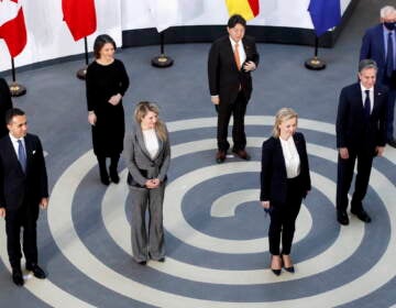 G7 foreign ministers, pose in a socially distanced manner for a group photo at the Museum of Liverpool, Liverpool, England, Saturday Dec. 11, 2021. Foreign Secretary Liz Truss is hosting U.S. Secretary of State Antony Blinken and other Group of Seven counterparts for weekend talks in the northwest England port city of Liverpool as the wealthy nations club faces growing tensions with Russia, China and Iran. From left, France's Minister for Europe and Foreign Affairs Jean-Yves Le Drian, Italy's Foreign Minister Luigi Di Maio, Germany's Foreign Minister Annalena Baerbock, Canada's Minister of Foreign Affairs Melanie Joly, Japan's Foreign Minister Yoshimasa Hayashi, Britain's Foreign Secretary Liz Truss, US Secretary of State Antony Blinken and European High Representative of the Union for Foreign Affairs Josep Borrell