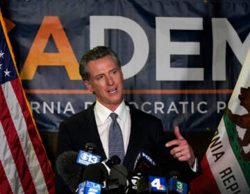 California Gov. Gavin Newsom addresses reporters, after beating back the recall that aimed to remove him from office, at the John L. Burton California Democratic Party headquarters in Sacramento, Calif., Tuesday, Sept. 14, 2021.  The recall election that once threatened Newsom’s political career has instead given it new life, The rare mid-term vote of confidence could fuel an ambitious legislative agenda featuring new corona virus vaccine mandates, housing for the homeless and health insurance for people living in the country illegally. (AP Photo/Rich Pedroncelli)