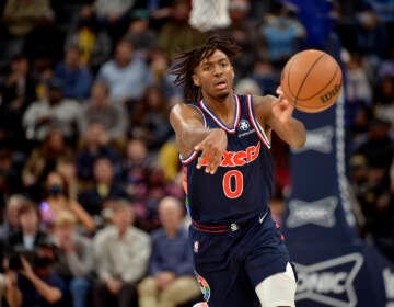 Philadelphia 76ers guard Tyrese Maxey (0) passes the ball in the first half of an NBA basketball game against the Memphis Grizzlies Monday, Dec. 13, 2021, in Memphis, Tenn. (AP Photo/Brandon Dill)