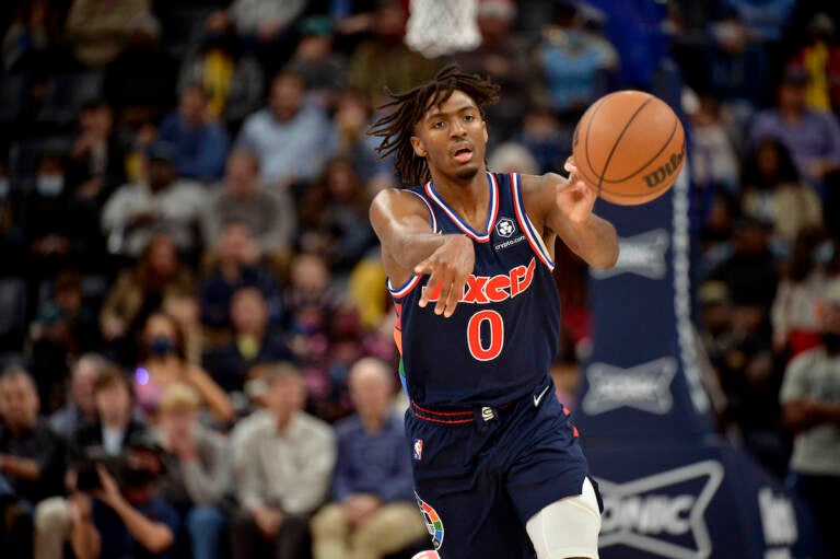 Philadelphia 76ers guard Tyrese Maxey (0) passes the ball in the first half of an NBA basketball game against the Memphis Grizzlies Monday, Dec. 13, 2021, in Memphis, Tenn. (AP Photo/Brandon Dill)