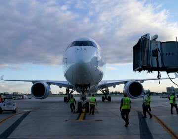 A Lufthansa flight arrives from Munich, Germany at Miami International Airport, Monday, Nov. 8, 2021, in Miami. Beginning Monday, bans on travel from specific countries are over. The U.S. will allow in international travelers, but they must be vaccinated — with a few exceptions