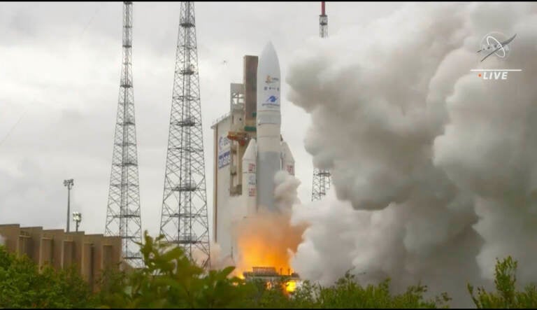 In this image released by NASA, Arianespace's Ariane 5 rocket with NASA's James Webb Space Telescope onboard, lifts off Saturday, Dec. 25, 2021, at Europe's Spaceport, the Guiana Space Center in Kourou, French Guiana. The $10 billion infrared observatory is intended as the successor to the aging Hubble Space Telescope
