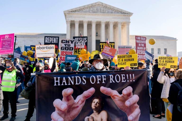 Abortion rights advocates and anti-abortion protesters demonstrate in front of the U.S. Supreme Court