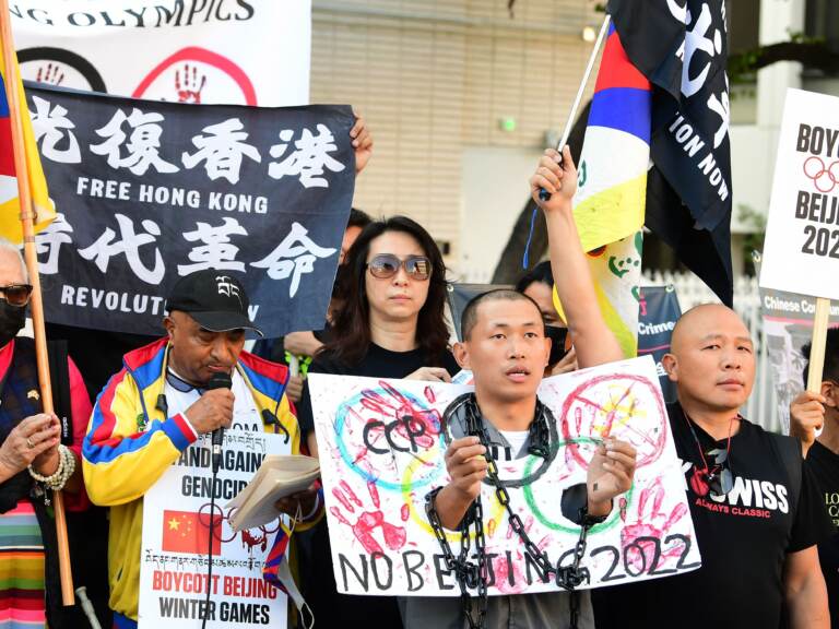 Activists rally in front of the Chinese Consulate in Los Angeles, California on November 3, 2021, calling for a boycott of the 2022 Beijing Winter Olympics due to concerns over China's human rights record. - Activists lobbied Olympic broadcasters, including NBC, BBC, CBC and Sky to 