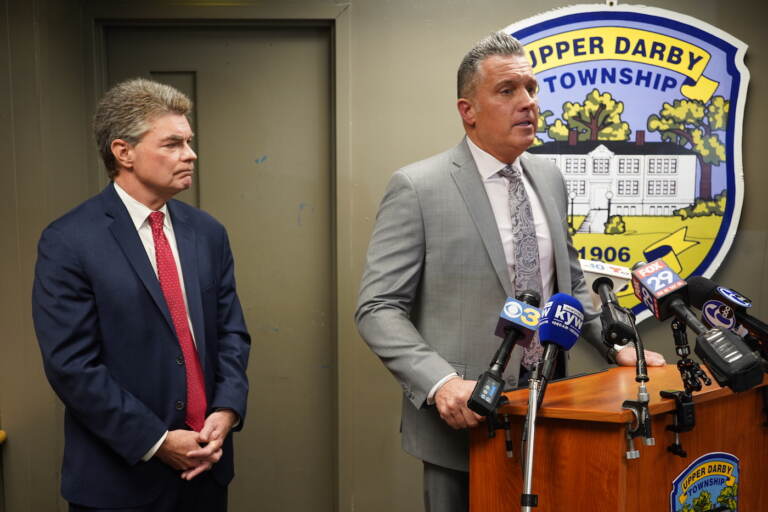 Delaware County District Attorney Jack Stollsteimer (L) and Upper Darby Police Superintendent Tomothy Bernhardt (R) announce charges following the shootout at the 69th Street Transportation Center. (Kenny Cooper/WHYY)