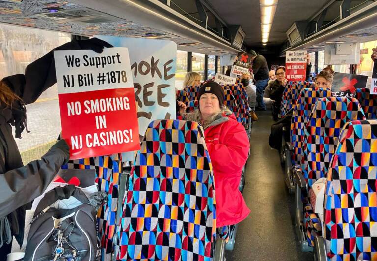 New Jersey casino workers want the state to implement a ban on smoking a casinos, citing health concerns. Advocates with Casino Employees Against Smoking Effects  organized a rally in Trenton on Dec. 9, 2021. (Tennyson Donyéa/WHYY)
