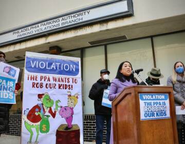 City Council member Helen Gym lambasts the Philadelphia Parking Authority for trying to reclaim money paid to the Philadelphia School District. (Emma Lee/WHYY)