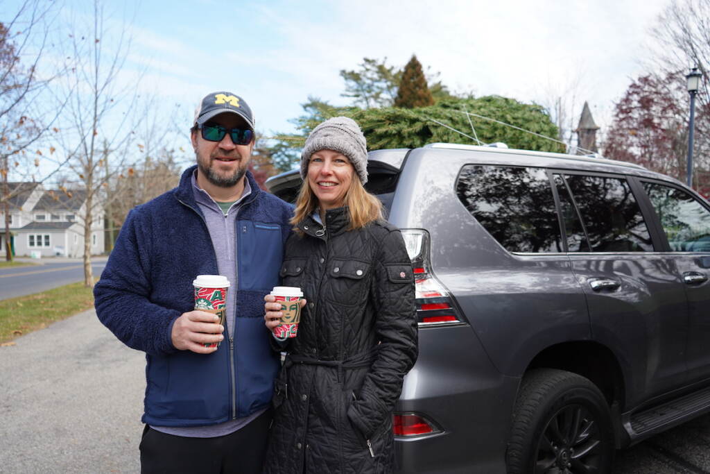 Michael and Emily Lamb have been picking up a tree from the Gladwyne firehouse every year for the last 10 years. (Kenny Cooper/WHYY)