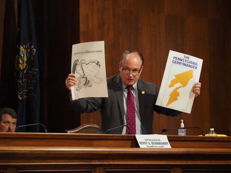 House GOP Leader Kerry Benninghoff holds up an image of a district he thinks is unacceptably gerrymandered