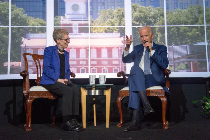 Terry Gross interviewing President Biden on a stage