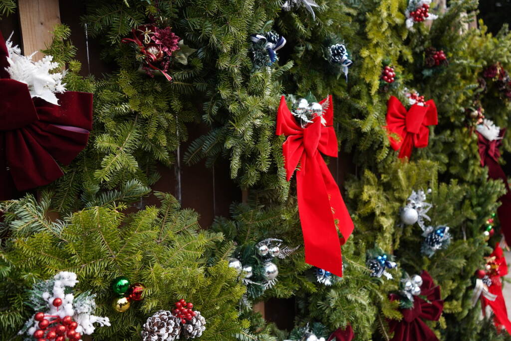 The wreaths are homemade under the supervision of a Gladwyne firefighter’s wife. (Kenny Cooper/WHYY)