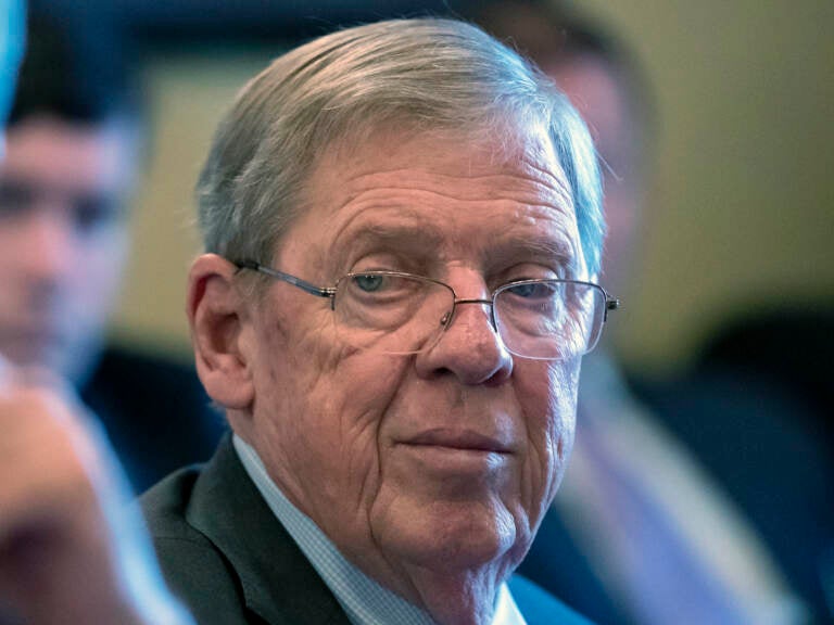 In this Feb. 14, 2019 photo, Sen. Johnny Isakson, R-Ga., leads a meeting on Capitol Hill. Isakson, an affable Georgia Republican who rose from the ranks of the state legislature to become a U.S. senator, has died at age 76. FILE - In this Feb. 14, 2019 photo, Sen. Johnny Isakson, R-Ga., leads a meeting on Capitol Hill in Washington. Isakson, an affable Georgia Republican politician who rose from the ranks of the state Legislature to become a U.S. senator, has died. He was 76. Georgia Gov. Brian Kemp’s office confirmed the death in a news release Sunday, Dec. 19, 2021. (AP Photo/J. Scott Applewhite, File)
