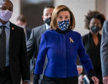 Speaker of the House Nancy Pelosi, D-Calif., arrives to update reporters on the must-pass priority of funding the government, during a news conference at the Capitol in Washington, Thursday, Dec. 2, 2021.
