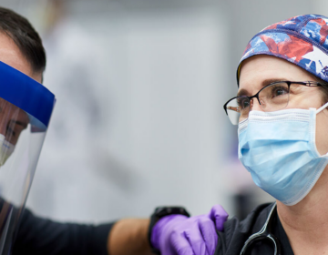 When Dr. Tiffany M. Osborn received her COVID-19 vaccination shortly after vaccines became available in late 2020, she felt hopeful about the pandemic's trajectory. A year later, she's sad and frustrated to see so many COVID patients in the ICU.
Matt Miller / Washington University School of Medicine