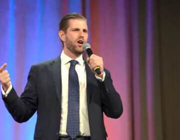 Eric Trump speaks to a conference