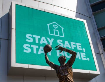 The Staples Center is seen in downtown Los Angeles with a sign that reads, 