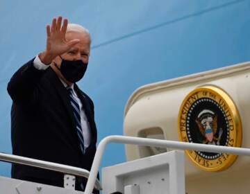 U.S. President Joe Biden waves from Air Force One before departing from Andrews Air Force Base, Maryland on March 16, 2021, en route to visit a small business in Chester, Pennsylvania to highlight how the American Rescue Plan helps small businesses. (Photo by ANDREW CABALLERO-REYNOLDS / AFP) (Photo by ANDREW CABALLERO-REYNOLDS/AFP via Getty Images)