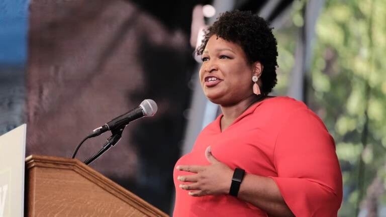 Voting rights activist Stacey Abrams speaks during a get-out-the-vote rally for Democratic gubernatorial candidate, former Virginia Gov. Terry McAuliffe at Ting Pavilion on October 24, 2021 in Charlottesville, Virginia. The Virginia gubernatorial election, pitting McAuliffe against Republican candidate Glenn Youngkin, is November 2.