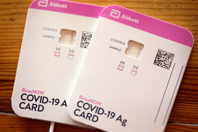 In this photo illustration, An at-home COVID-19 test by Abbott shows a positive result on September 14, 2021 in Chicago, Illinois. At-home tests are becoming increasingly difficult to find despite manufacturers boosting production as COVID-19 cases rise in schools and employers increase monitoring