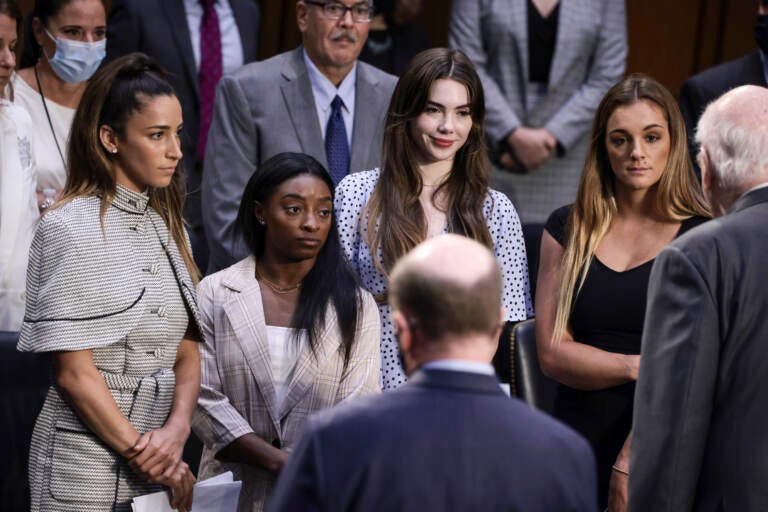 From left, U.S. Olympic gymnasts Aly Raisman, Simone Biles, McKayla Maroney and NCAA and world champion gymnast Maggie Nichols are shown after their testimony during a Senate Judiciary hearing on Sept. 15 about the FBI handling of the investigation of Larry Nassar's sexual abuse of gymnasts. (Anna Moneymaker/Getty Images)