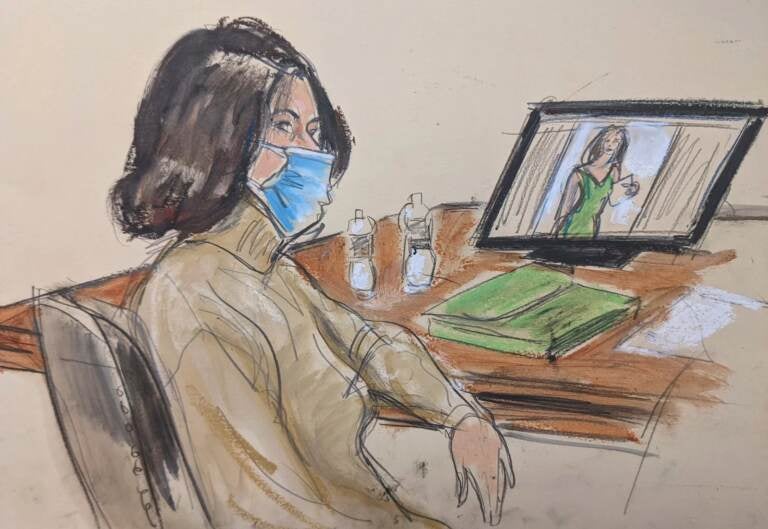 In this courtroom sketch, Ghislaine Maxwell is seated at the defense table while watching testimony of witnesses during her trial, Tuesday, Nov. 30, 2021, in New York