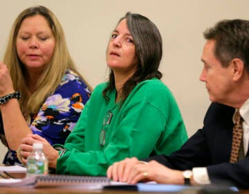 Michelle Lodzinski (center) appears for her sentencing