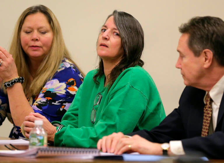 Michelle Lodzinski (center) appears for her sentencing