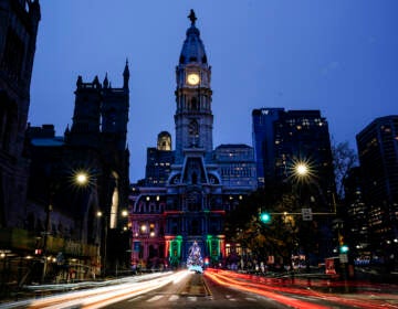 A Christmas Tree is lit up outside City Hall in Philadelphia