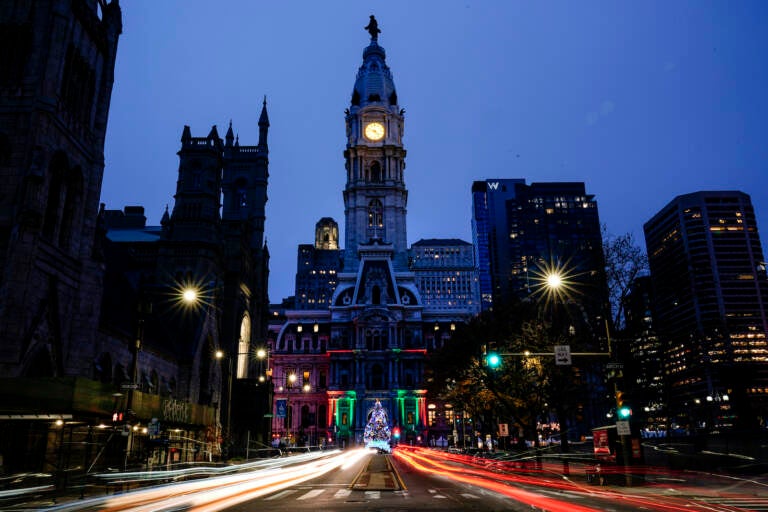 A Christmas Tree is lit up outside City Hall in Philadelphia