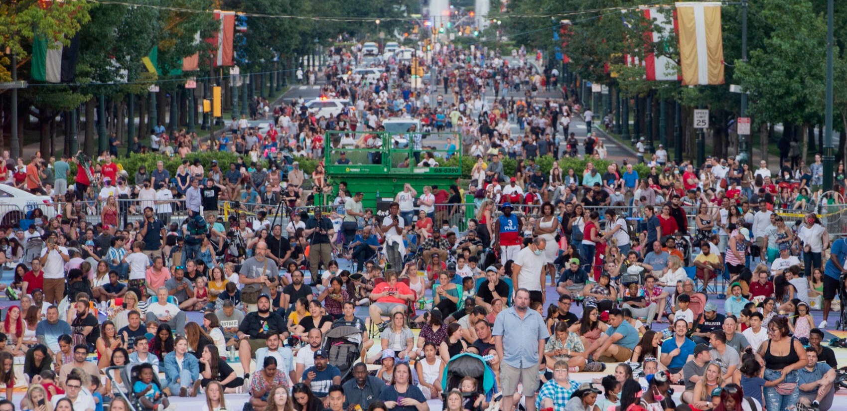 Thousands gathered at Eakins Oval and along the Benjamin Franklin Parkway hours ahead the scheduled 9:30 pm fireworks display