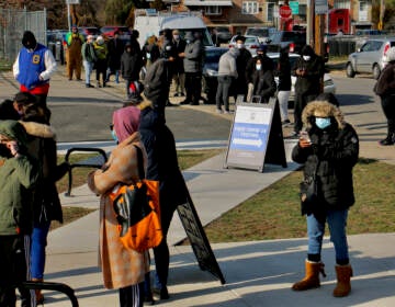 People line up for free COVID-19 tests outside Cibotti Recreation Center